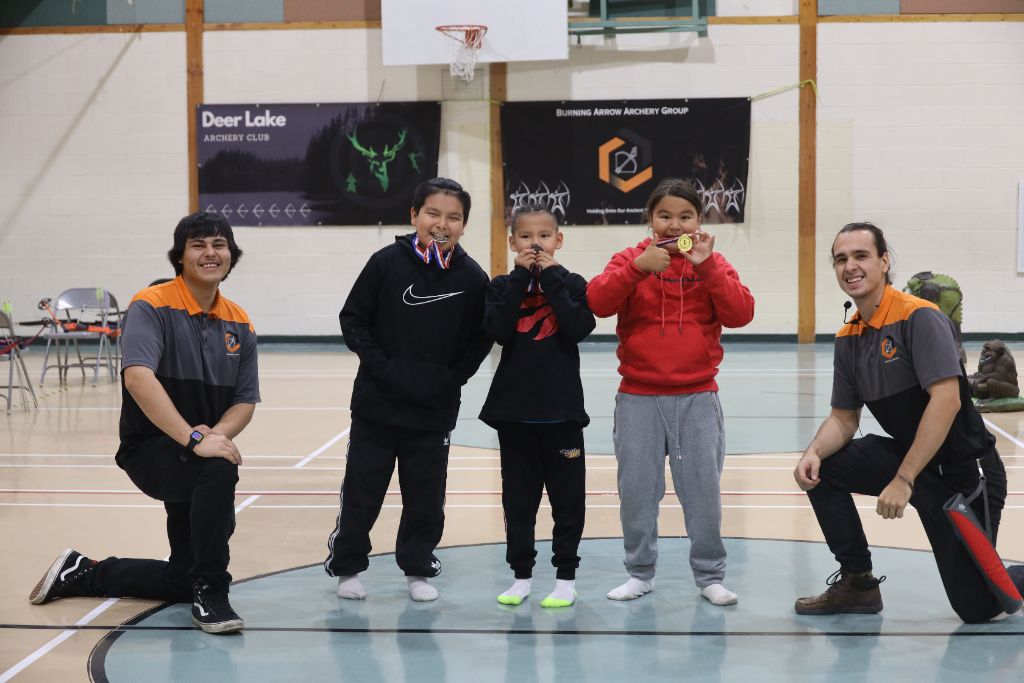 Youth archery line at Burning Arrow community event